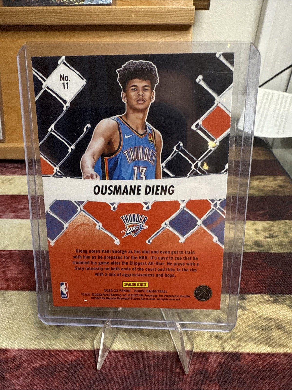 2022-23 Panini NBA Hoops - We Got Next Ousmane Dieng #11 Holo (RC)
