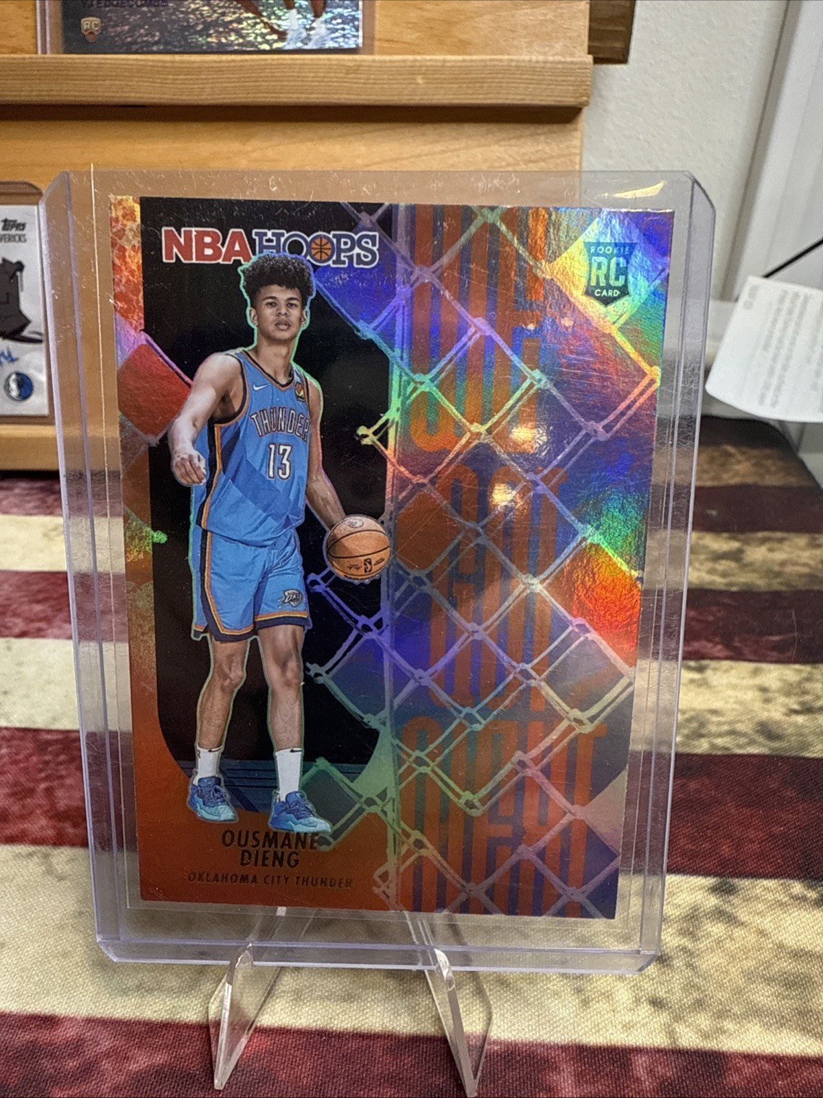 2022-23 Panini NBA Hoops - We Got Next Ousmane Dieng #11 Holo (RC)